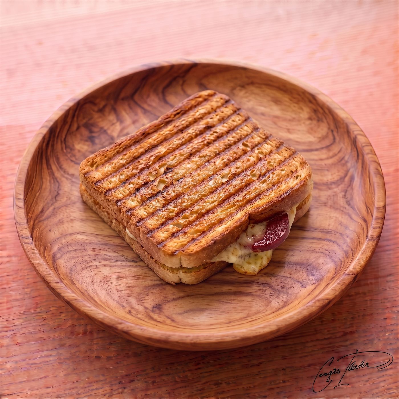 A classic Turkish karışık tost (mixed grilled toast) on a carved wooden plate, showing deep, crispy grill marks on the bread with melted cheese and sliced sucuk (Turkish sausage) oozing from the center.